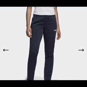 Adidas sweatpants.